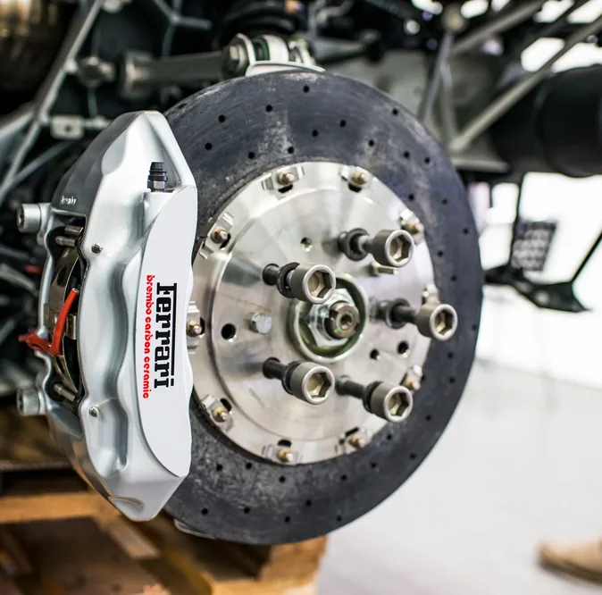 Close-up of a brake disc and caliper on a car wheel