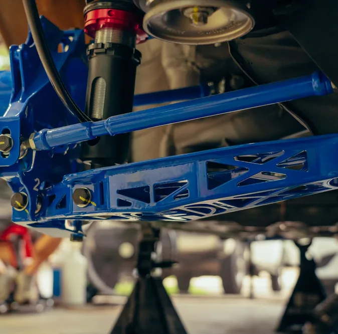 Vehicle suspension component in an auto workshop